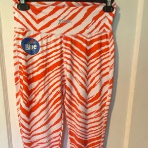 Orange striped labat blue leggings
